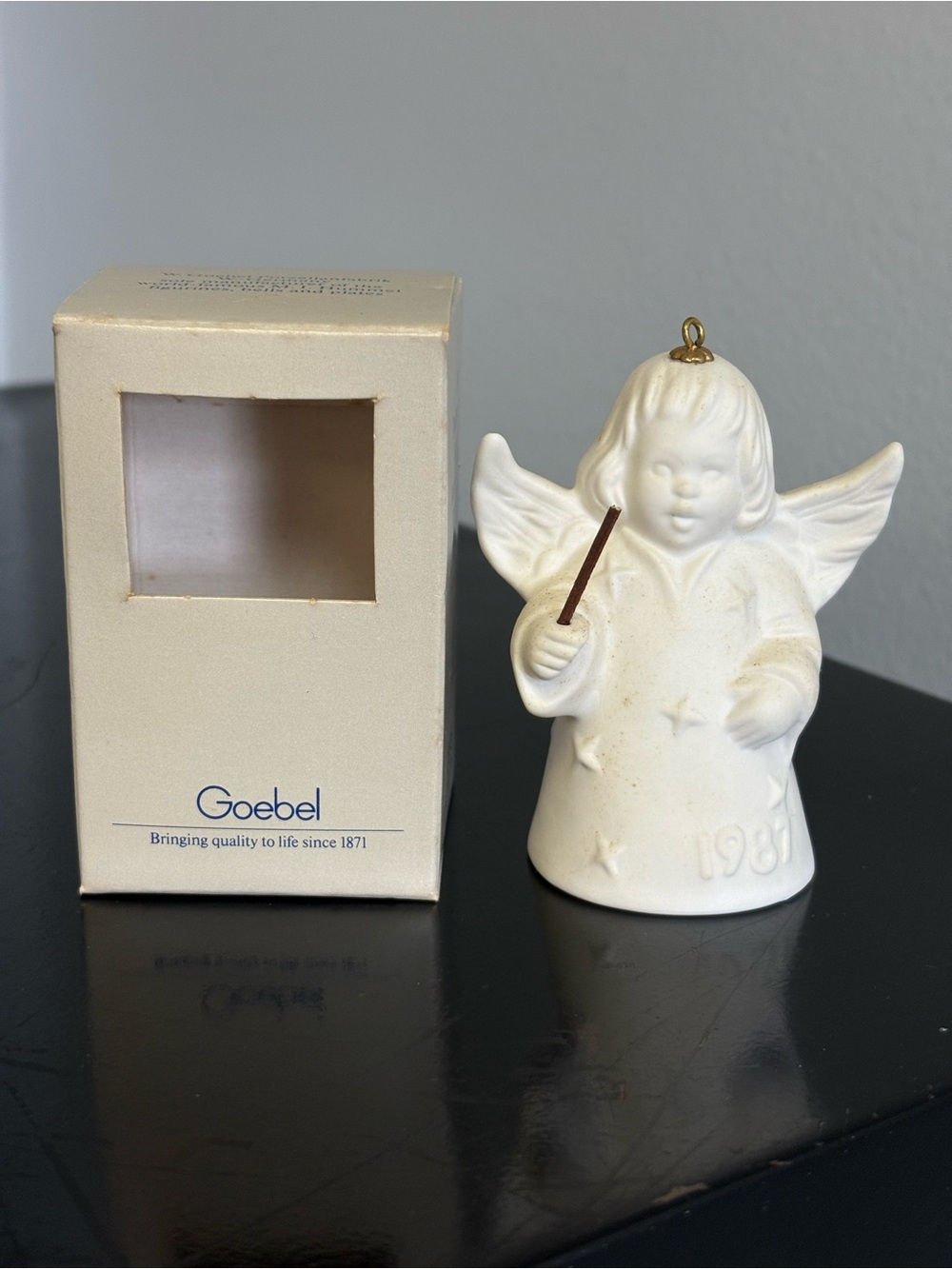 1987 Goebel Twelfth Edition Annual Angel Bell, made of white bisque porcelain.